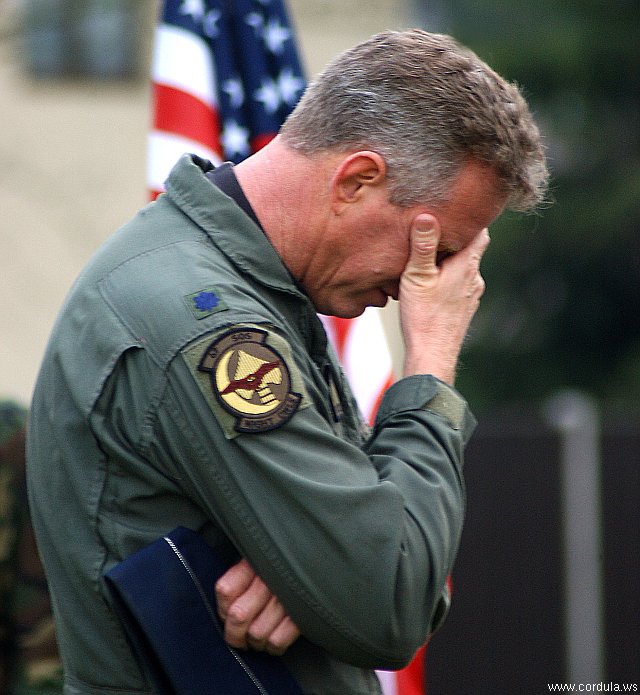 Cordula's Web. USAF. Lt. Col. Kenneth Denman grieves during a candlelight vigil to honor nine Airmen who died in a crash.