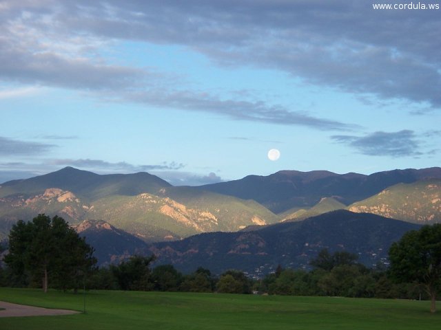 Cordula's Web. Flickr. Full moon going down at sunrise, Colorado Springs.