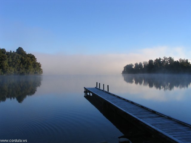 Cordula's Web. Wikicommons. Morning Mist on Lake Mapourika, NZ.