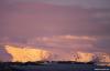 Cordula's Web. NOAA. Glacier behind pink clouds.